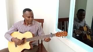 Urwibutso rw,Umutoni by nkomeje landouard covered by (Emma guitar ) Tel : 0783824710.