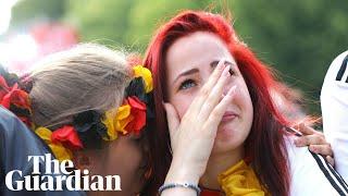 German fans react as champions are knocked out of World Cup