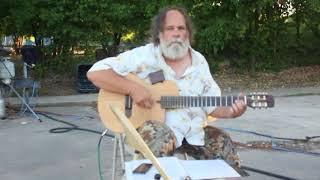 Homeless hermit plays guitar for tips(update)