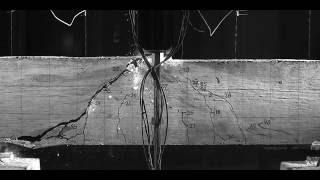 Investigation of the unit shear strength of a scaled reinforced concrete beam (Small Beam C-1)