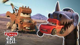 Mater Saves Lightning McQueen from the Dinosaurs | Cars on the Road | Pixar Cars