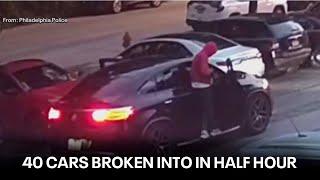 Philly police investigating 40 cars broken into in a half hour