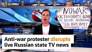 Anti-war protester disrupts live Russian state TV bulletin