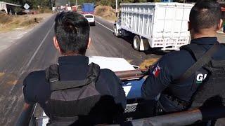 Police Escort Truckloads of Avocados Through Mexico