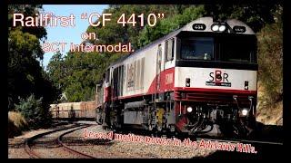 SCT Intermodal with "Railfirst"  CF4410 locomotive.