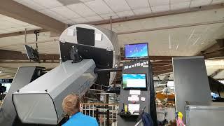 Jada Perez Flying/Operating An F-18 Simulator at the National Naval Museum in Pensacola FL 3/18/2022