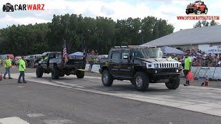 Black Dodge Vs Black Hummer H2 At Truck Warz Tug Of War in Michigan