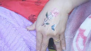 Create a rose and leaf tattoo for a Christmas outing