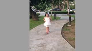 Little girl walking like a model. She’s my princess!