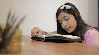 Young Girl Reading Bible Stock Video | Free Stock Video - Alaine Stocks