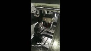 CNC lathe with automatic changing-over device