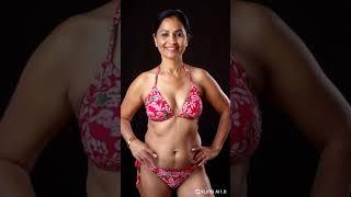 Indian mature aunty posing in a beach bikini