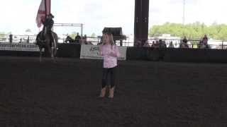 Amalia Brignoni Sings the National Anthem at Silver Spurs Rodeo