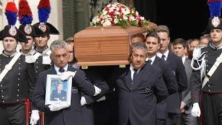 Italy's political elite and fans bid farewell to ex-Premier Silvio Berlusconi in Milan