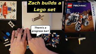 Zach Hazard builds a Lego set