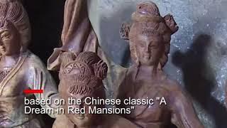 Root carving work from Chinese classic "A Dream in Red Mansions" | CCTV English