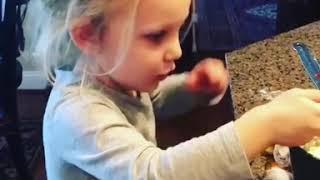 Little Girl Drops Egg Yolk on Floor After Struggling to Break It - 1014054