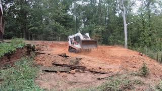 Backyard grading, flatten a hill for sod installation greater Atlanta.