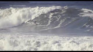 Surfers compete on powerful waves of over 13 feet in Brazil's Itacoatiara Big Wave event