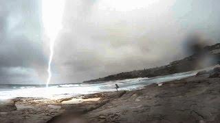 Lightning almost strikes girl in Sydney!!! Boyfriend's reaction is priceless!!!!