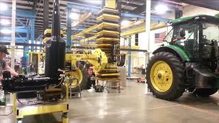 Semi-automated ergonomic lift assist for tractor assembly
