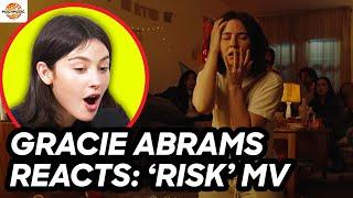 GRACIE ABRAMS REACTS TO HER OWN ‘RISK' MUSIC VIDEO