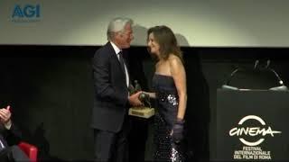 Debra Winger presents Richard Gere with an award at the Rome Film Festival (2011)