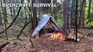 Building a shelter to hide from rain and wind. Bushcraft adventures far from civilization. ASMR