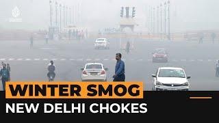 New Delhi chokes as winter haze thickens