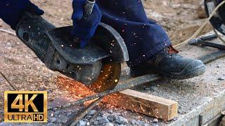 Royalty Free 4K Stock Footage | Free Download | Construction Worker Cuts Steel