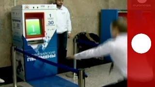 Video: Squat-to-ride ticket machine in Moscow metro supports Sochi 2014