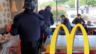 Garda Riot Squad enter McDonald's in Coolock Dublin