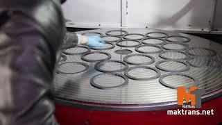 MAKTRANS: Grinding steel discs ona carousel grinder