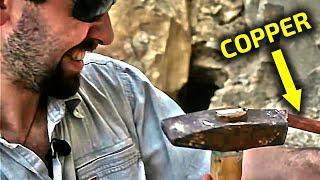 Copper chisel against rock | Geologist against myths