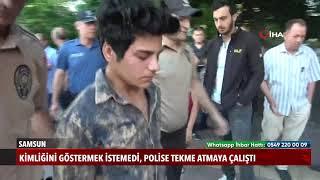 Kimliğini göstermek istemeyen genç, polislere tekme atmaya çalıştı