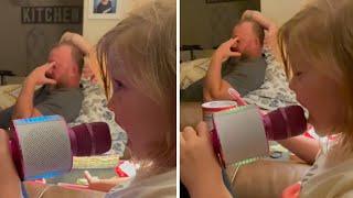 Dad has priceless reaction when daughter sings into microphone #Shorts