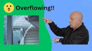 Why do my gutters overflow in heavy rain?