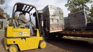 Forklift unloading cinder blocks
