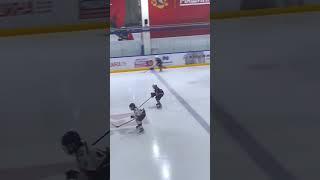 Skating backwards. 8 years old. Hockey exercise