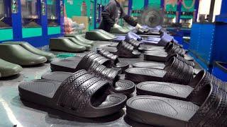 Interessanter Slide Sandal Massenproduktion Prozess. Fabrik zur Herstellung von EVA-Hausschuhen