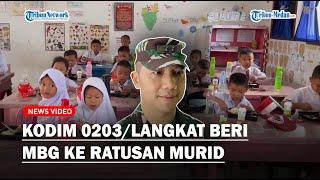 Kodim 0203/Langkat Beri Makan Bergizi Gratis ke Ratusan Murid di Langkat, Ada Alat Tulis dan Biskuit