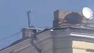 Euromaidan - Riot police shoots at protesters from roof in Kiev Ukraine