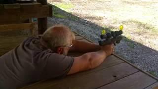 Scoped Kel-Tec CP33 Chewing Up A Bowling Pin At 110 Yards