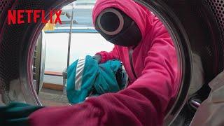 Squid Game Pink Guards Spotted At A Local Laundromat | Netflix