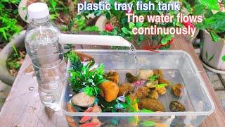 Make fountains and fish tanks using plastic trays with a continuous flow of plastic bottles