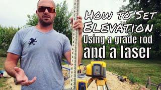 HOW TO SET ELEVATION BASED OFF OF A HUB || How to take elevation using a grade rod and a laser