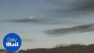 Flying objects captured shooting around early morning sky - Daily Mail