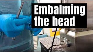 Embalming the head
