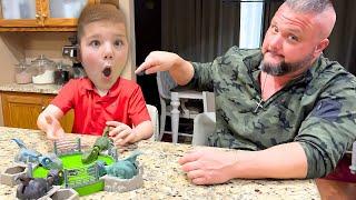 CALEB and Dad Play Jurassic World RAVENOUS RAPTORS Board Game for Kids!