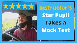 James takes his first UK mock driving test. 2021